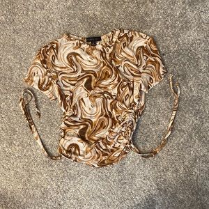 Brand faded rose. Sheer, swirl of brown and tan